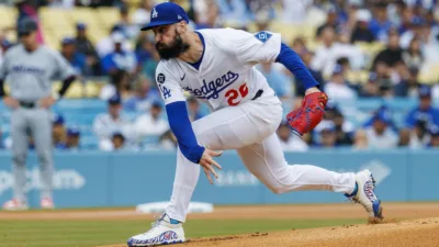 Tony Gonsolin: The Resilient Return of the Dodgers' All-Star Pitcher 4 Tony Gonsolin Dodgers pitcher delivering fastball vs Mets
